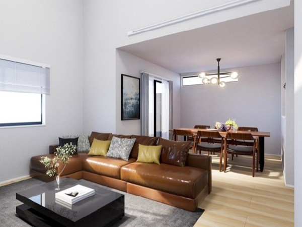 開放感溢れる勾配天井仕様の2階リビング。バルコニーに繋がる窓からは柔らかい光と爽やかな風が入ります。